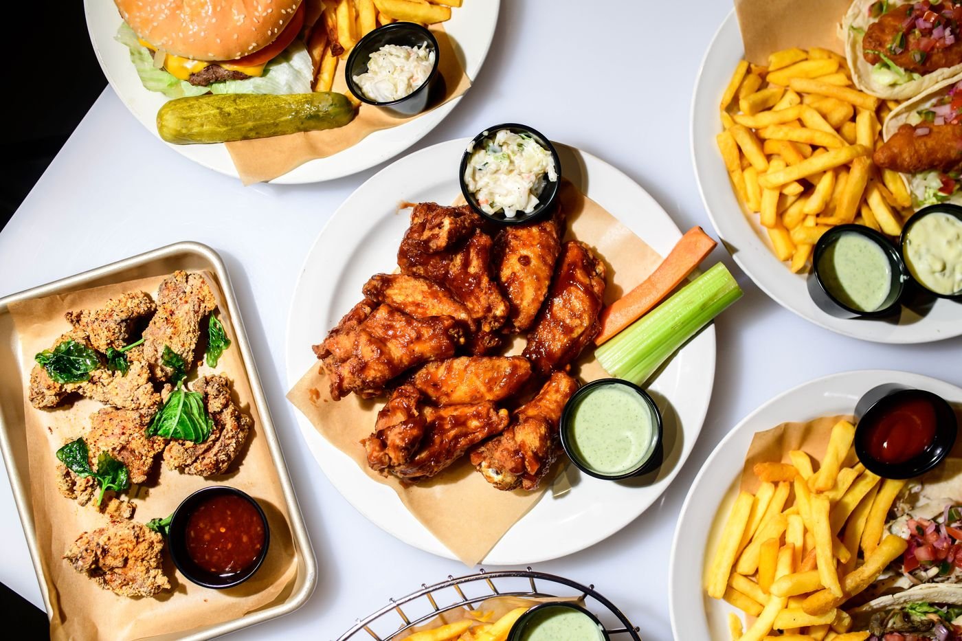 Chicken wings and food spread at iRock